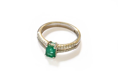 Lot 40 - An 18 Carat White Gold Emerald and Diamond...