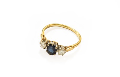 Lot 43 - A Sapphire and Diamond Three Stone Ring, marks...