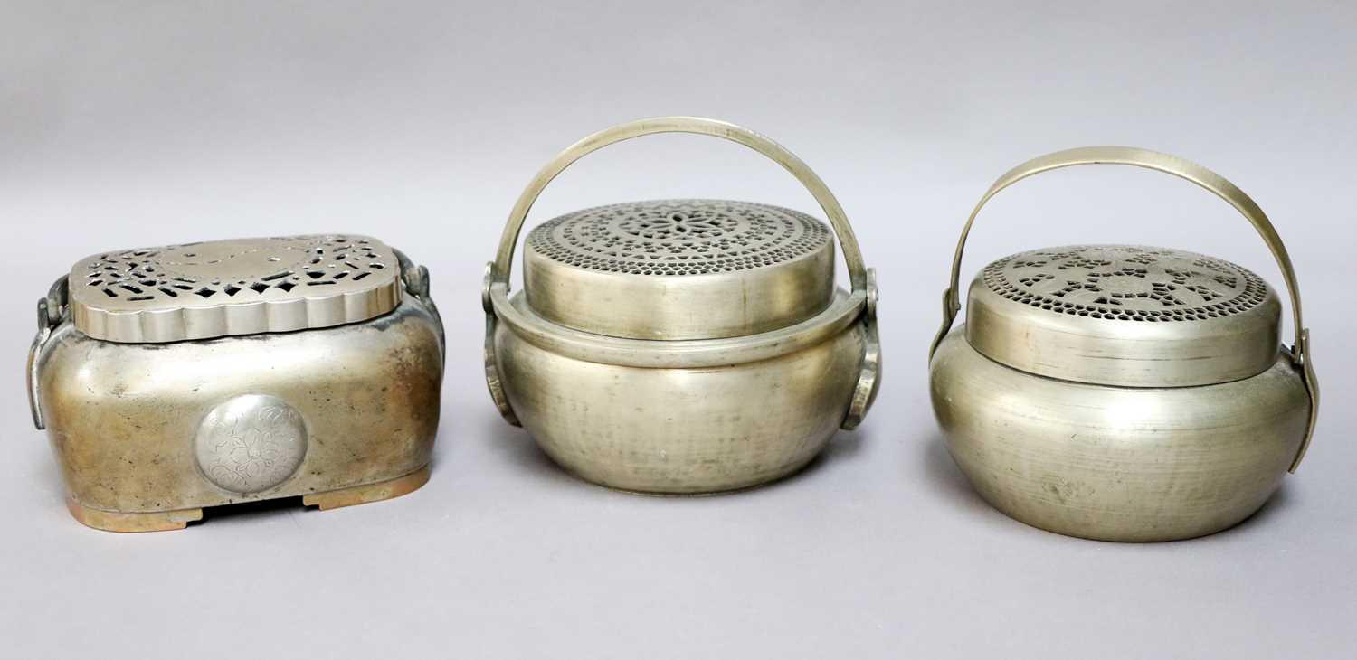 Lot 238 - Three Chinese Metal Hand Warmers, Qing dynasty,...