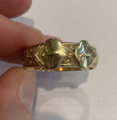 Lot 60 - A 9 Carat Gold Buckle Motif Ring, finger size Z+2