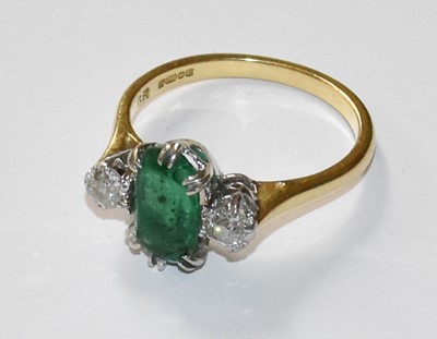 Lot 69 - An 18 Carat Gold Emerald and Diamond Cluster...