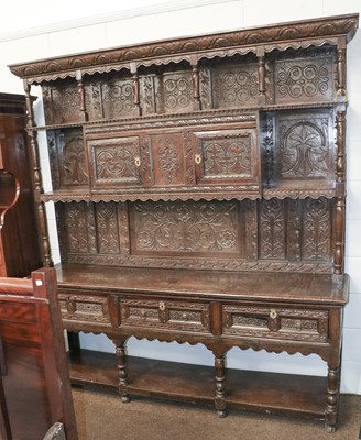 Lot 1280 - An Impressive 19th century Carved Oak Dresser,...