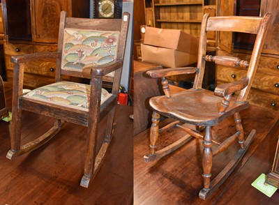 Lot 1363 - An Early 20th Century Oak Childs Rocking...