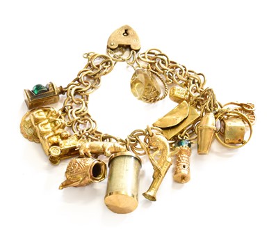 Lot 40 - A 9 Carat Gold Fancy Link Bracelet, hung with...