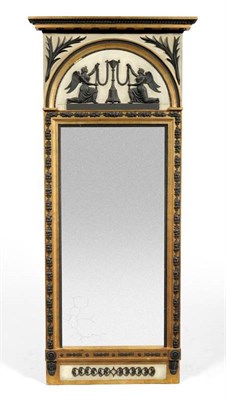 Lot 1291 - A Regency Gilt and Gesso Pier Glass, circa 1815, with rectangular mirror plate and ebonised...