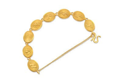 Lot 2296 - A Fancy Link Bracelet the eight yellow oval...