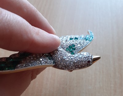 Lot 2354 - An Emerald and Diamond Brooch