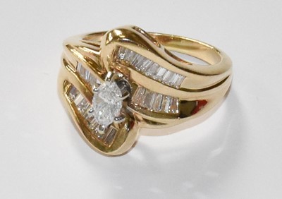 Lot 75 - A 14 Carat Gold Diamond Ring, the central...
