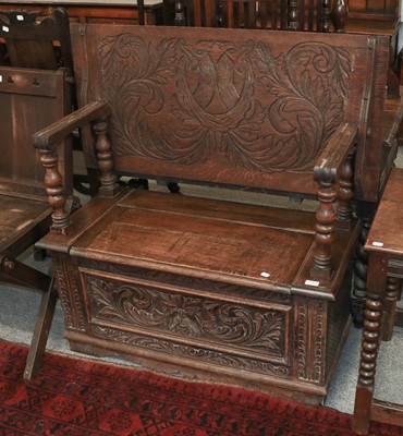 Lot 1163 - A Carved Oak Monks Bench, 99cm by 46cm by...