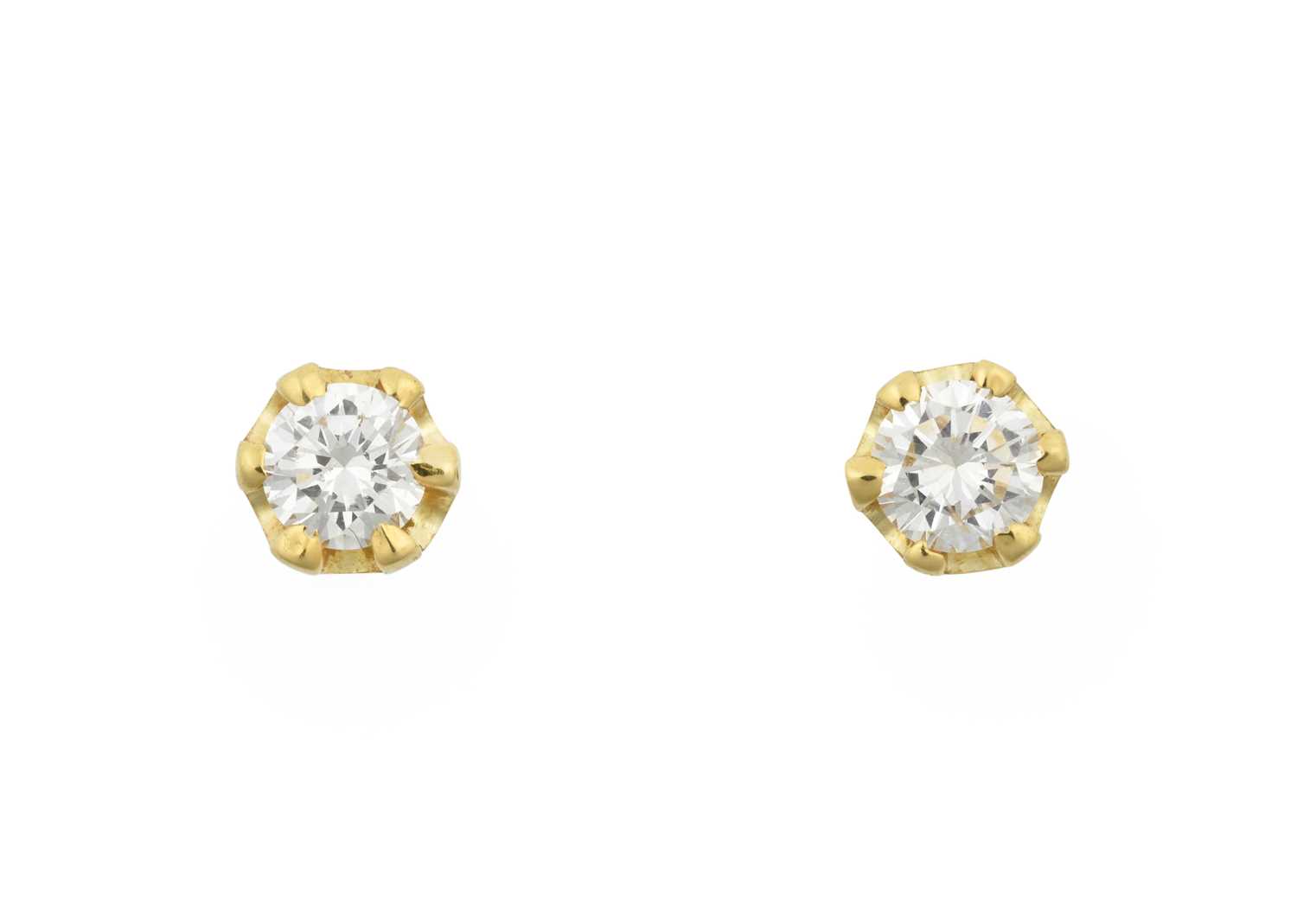 Lot 2307 - A Pair of 18 Carat Gold Diamond Solitaire...