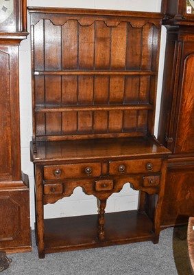 Lot 1172 - An Oak Titchmarsh & Goodwin Dresser, of small...