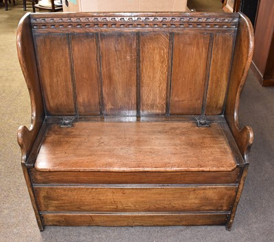 Lot 1289 - A Titchmarsh & Goodwin Oak Settle, chip carved,...