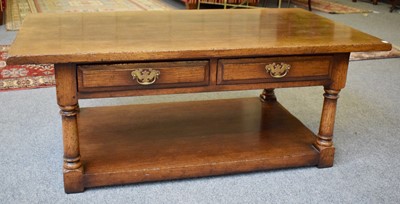 Lot 1116 - A Reproduction Oak Two Drawer Coffee Table in...