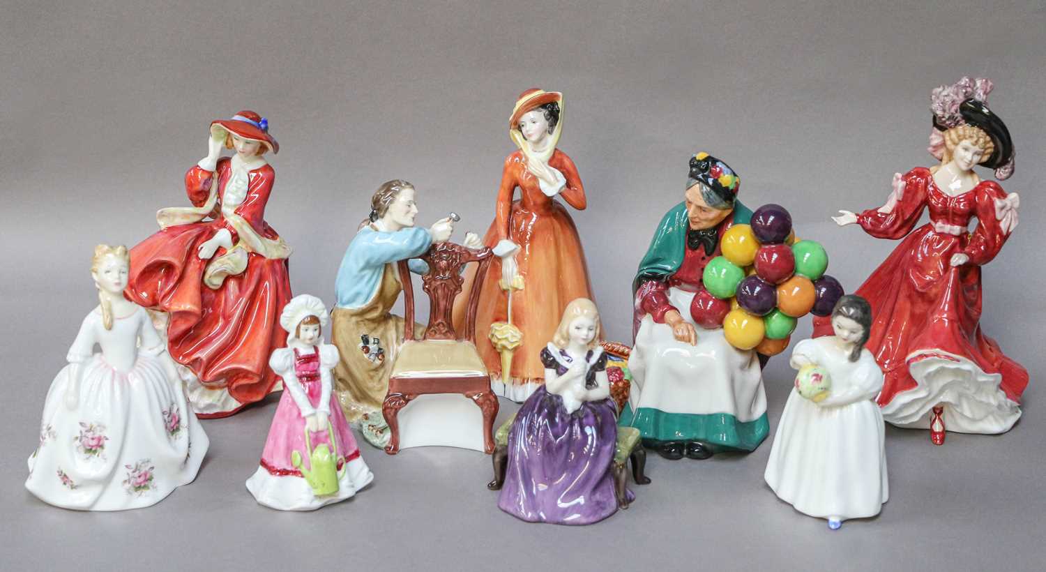 Lot 294 - Nine Royal Doulton Figures, including The...