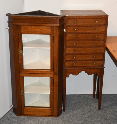 Lot 1097 - An Edwardian Mahogany Chest of Seven Glove...