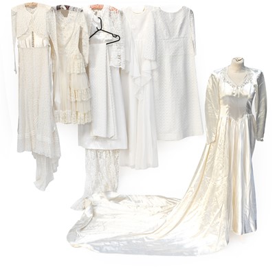 Lot 2023 - Mid 20th Century Wedding Dresses, comprising a...