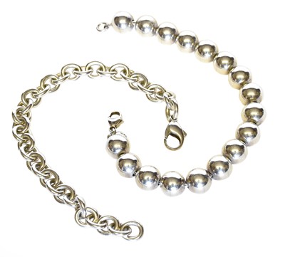 Lot 5069 - Tiffany & Co Ball Bracelet on a silver link...