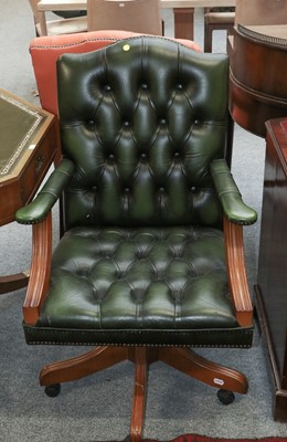 Lot 1152 - A Reproduction Office Swivel Armchair, with...