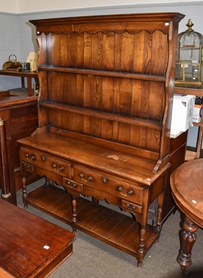 Lot 1271 - A Reproduction Oak Dresser With Enclosed Rack,...