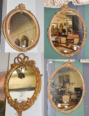 Lot 1360 - A Gilt framed Girandole Oval Wall Mirror, with...