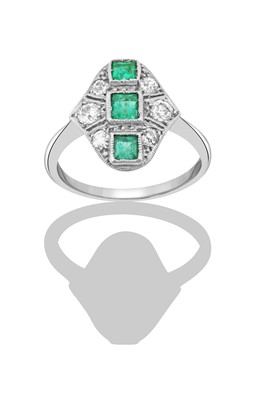 Lot 2300 - An Emerald and Diamond Ring, first quarter...