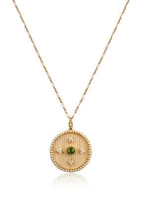 Lot 2367 - An Edwardian Peridot and Split Pearl Pendant...