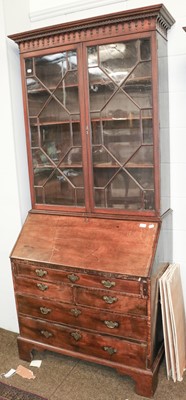 Lot 1300 - A Bureau Bookcase, the astragal glazed top...