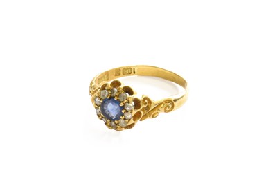 Lot 22 - An 18 Carat Gold Sapphire and Diamond Cluster...