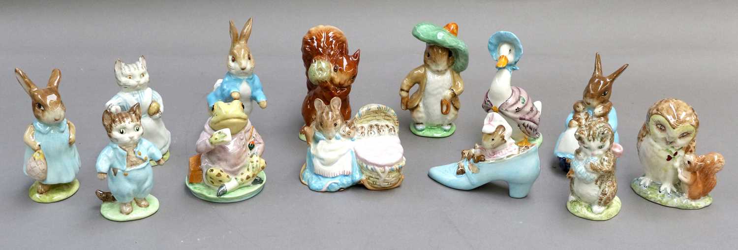 Lot 204 - A collection of Thirteen Beatrix Potter figures