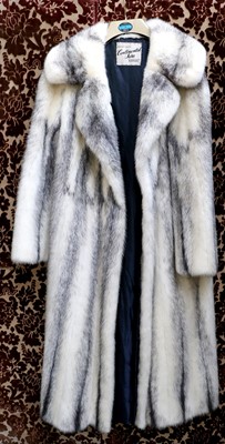 Lot 386 - Continental Furs, a grey and white striped...