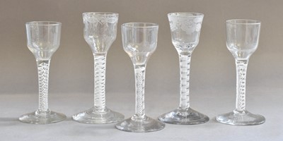 Lot 180 - A Group of Five George III Air Twist Drinking...