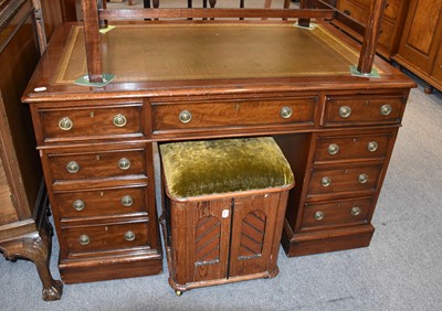 Lot 1261 - A Mahogany Kneehole Desk, with green leather...