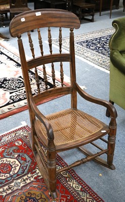 Lot 1297 - A 20th Century Cane Seated Rocking Chair