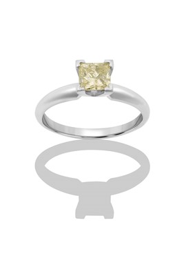 Lot 2343 - A Diamond Solitaire Ring the fancy yellow...