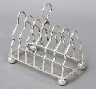 Lot 104 - A George V Silver Toastrack, by Martin and...