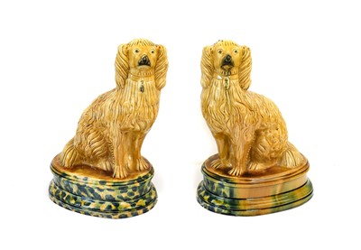 Lot 251 - A Pair of Majolica Seated Spaniels, circa 1870,...
