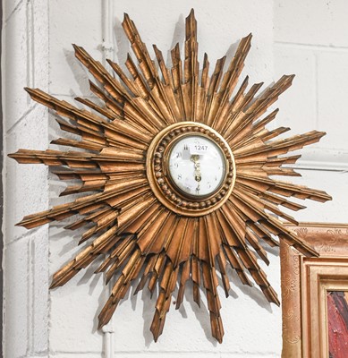 Lot 1247 - A Giltwood Sunburst Wall Timepiece, with...