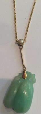 Lot 138 - A Jade and Split Pearl Necklace, stamped '9CT',...