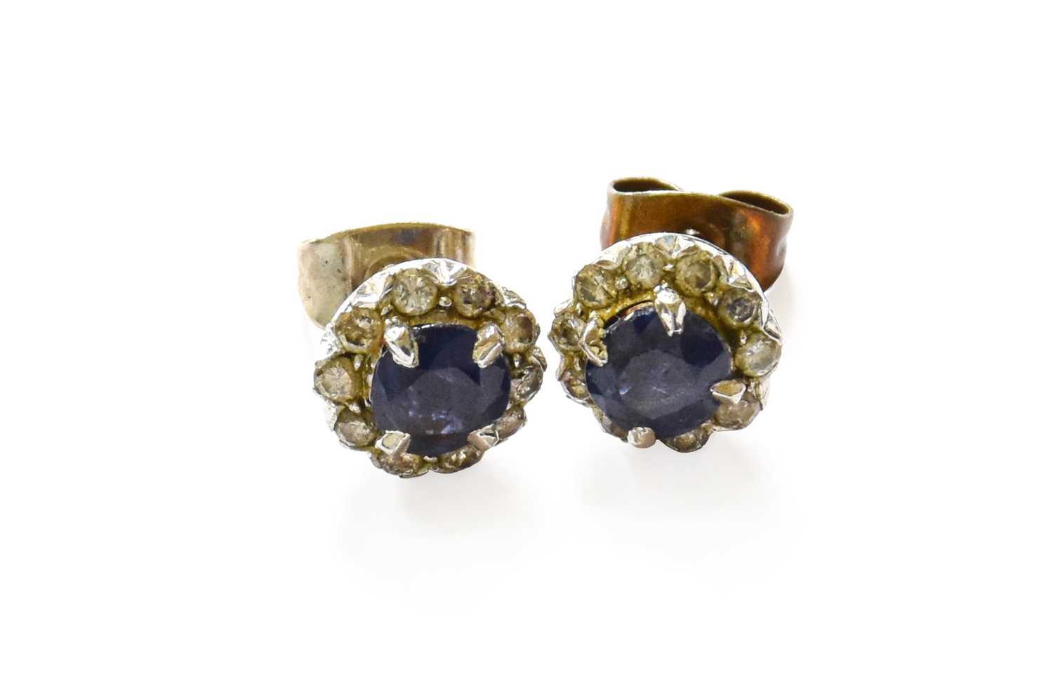 Lot 13 - A Pair of Sapphire and Diamond Cluster...