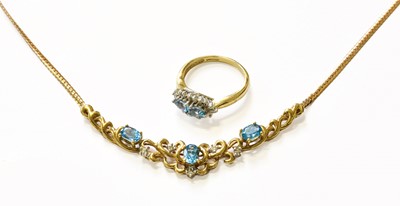 Lot 87 - A 9 Carat Gold Blue Topaz and Diamond Cluster...