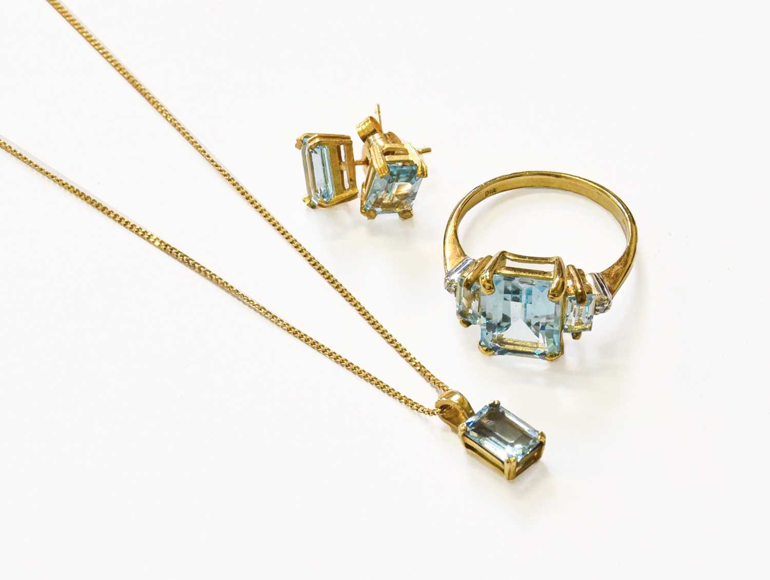 Lot 85 - A Blue Topaz Pendant on Chain, Earring and...