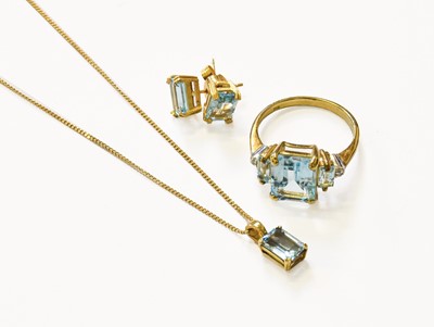 Lot 85 - A Blue Topaz Pendant on Chain, Earring and...