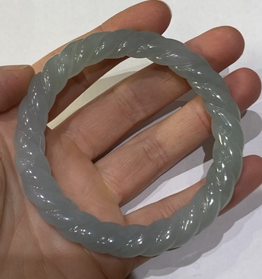 Lot 91 - A Chinese Jadeite Pendant, loop stamped '585',...