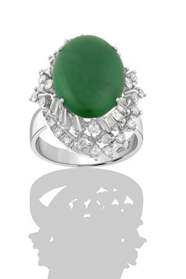 Lot 2289 - A Jade and Diamond Ring the oval jade plaque...