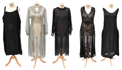 Lot 2095 - Early 20th Century Dresses comprising a black...