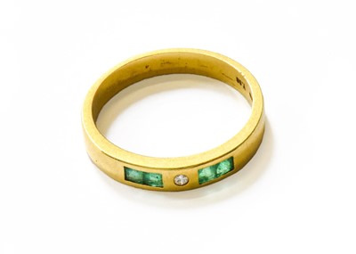 Lot 44 - An Emerald and Diamond Half Hoop Ring, finger...
