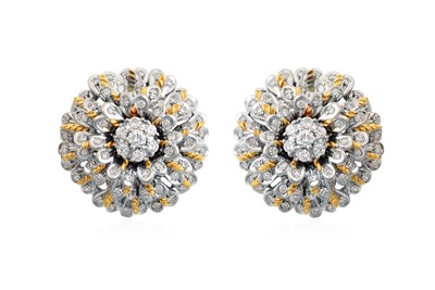 Lot 2012 - A Pair of Diamond Cluster Earrings the central...