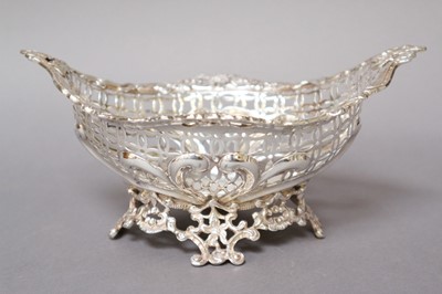 Lot 197 - A Victorian Silver Basket, by William Comyns,...