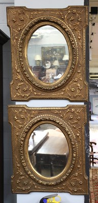 Lot 1449 - A Pair of Gilt-Framed Hanging Mirrors, moulded...