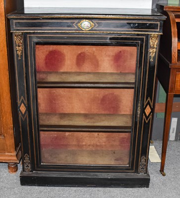 Lot 1244 - An Ebonised Pier Cabinet, gilt metal mounted...